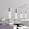 white glass cosmetic bottle 1.jpg